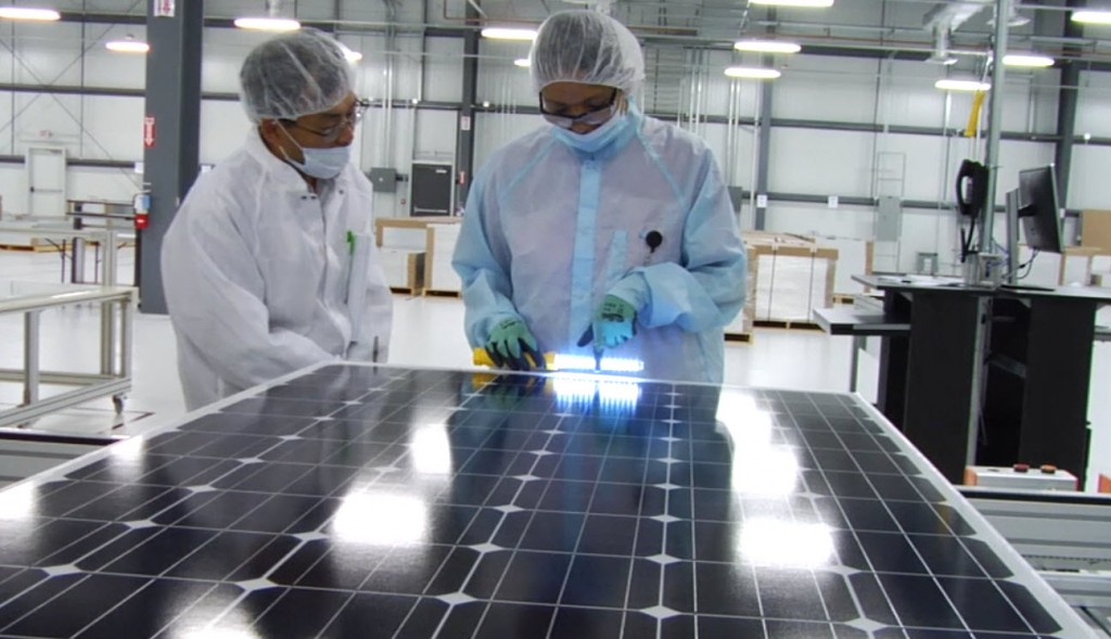 (Image) Mission Solar employees inspect each solar module at the manufacturing facility at Brooks City Base.