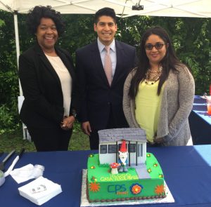 Interim CEO & President Paula Gold-Williams, District 4 Councilman Rey Saldana help Crystal Granato celebrate her home being the 15,000th to be weatherized. 