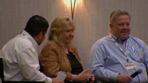 (Image) Doreen Welsh answers questions during a fireside chat with Rudy Garza, Senior Vice President of Distribution Services &amp; Operations, and Fred Bonewell, Chief Security &amp; Safety Officer.