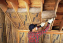 Photo of adding fiber insulation to home attic