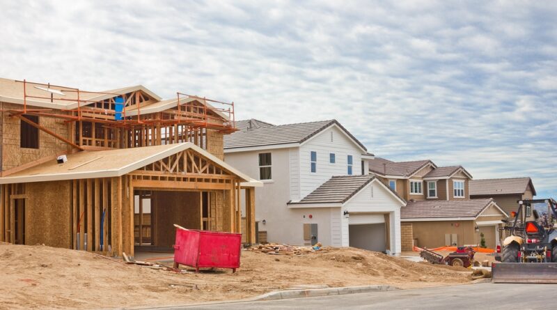 A photo of houses being built in a Subdivision