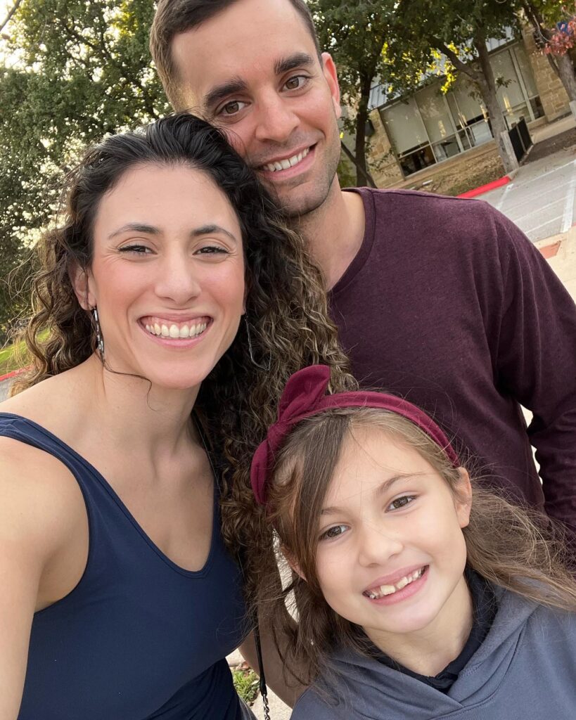 Marissa Myers with her husband, Walker, and daughter, Jade.