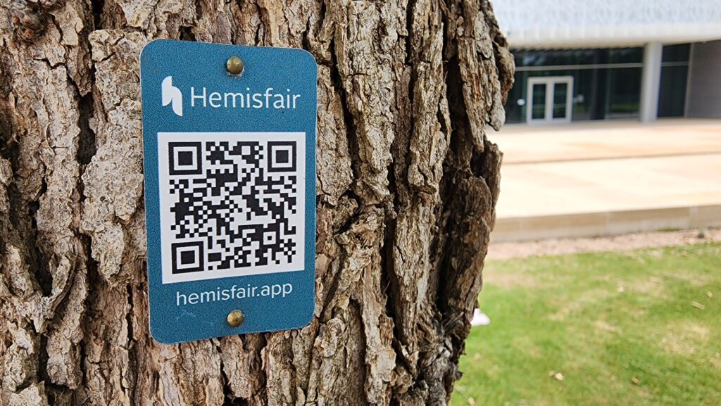 A photo of QR code on a rescued tree at the Hemisfair park